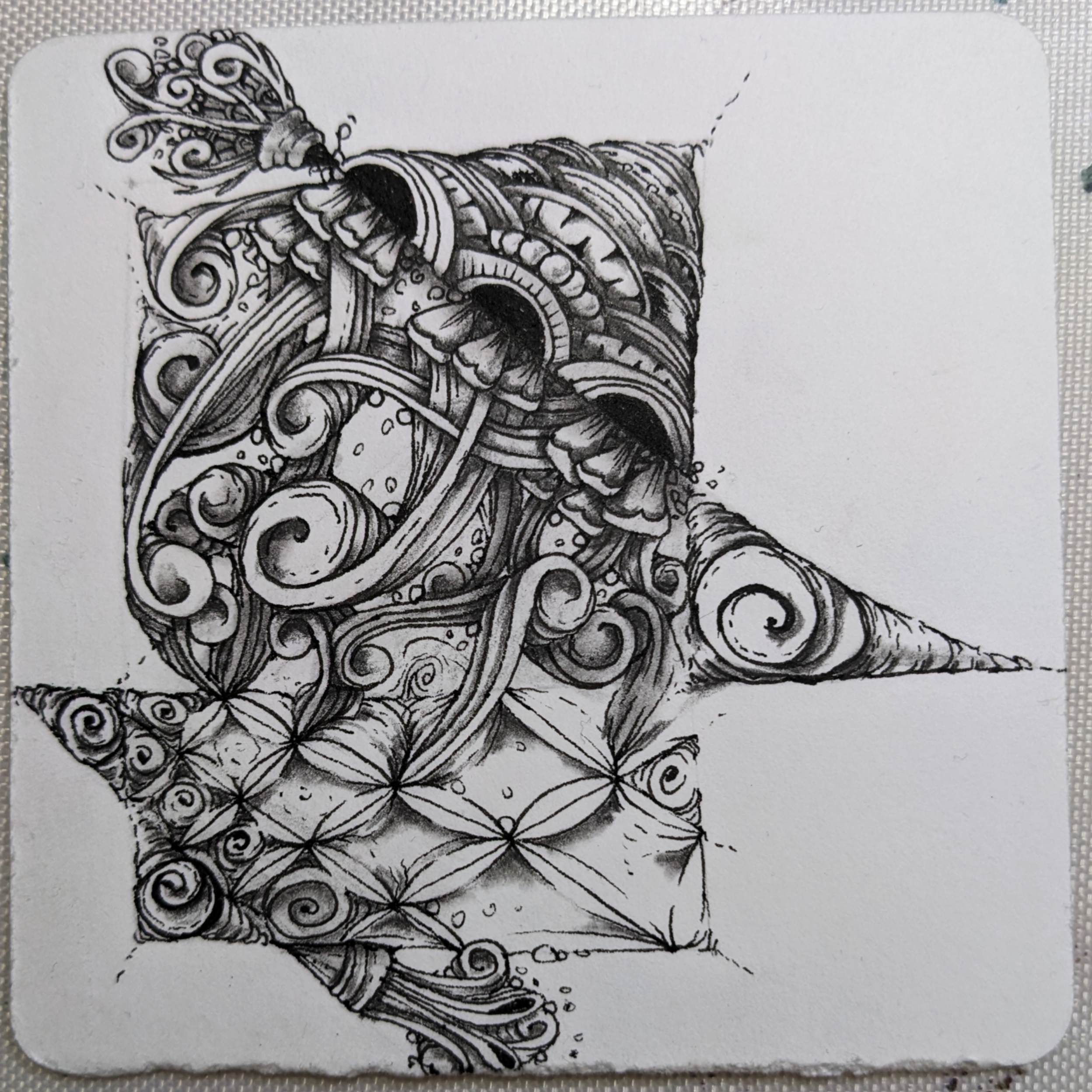 A back-to-basics Zentangle tile drawn with a Z string
